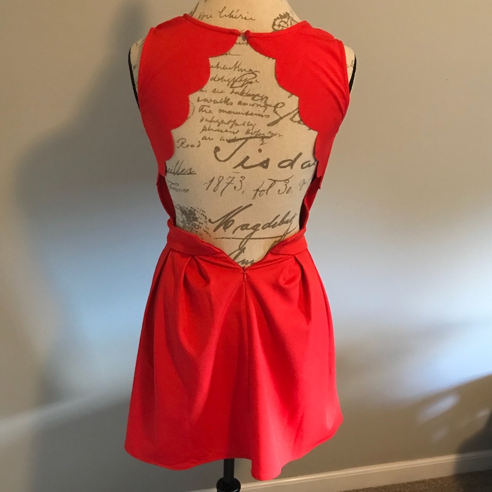 Open back orange mini dress